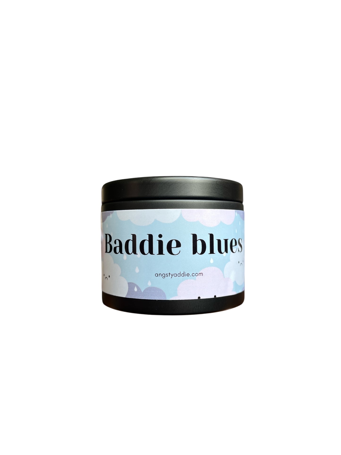 a cylindrical container with a label that reads "Baddie blues" and a website address "angstyaddie.com".