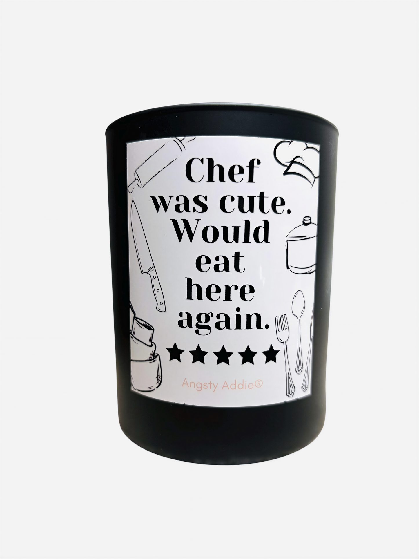 a black cylindrical container with a white label that contains text and illustrations of kitchen utensils.